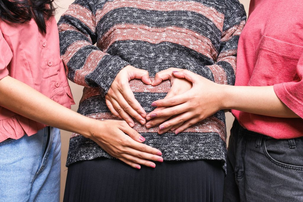 Women Support Pregnant Woman